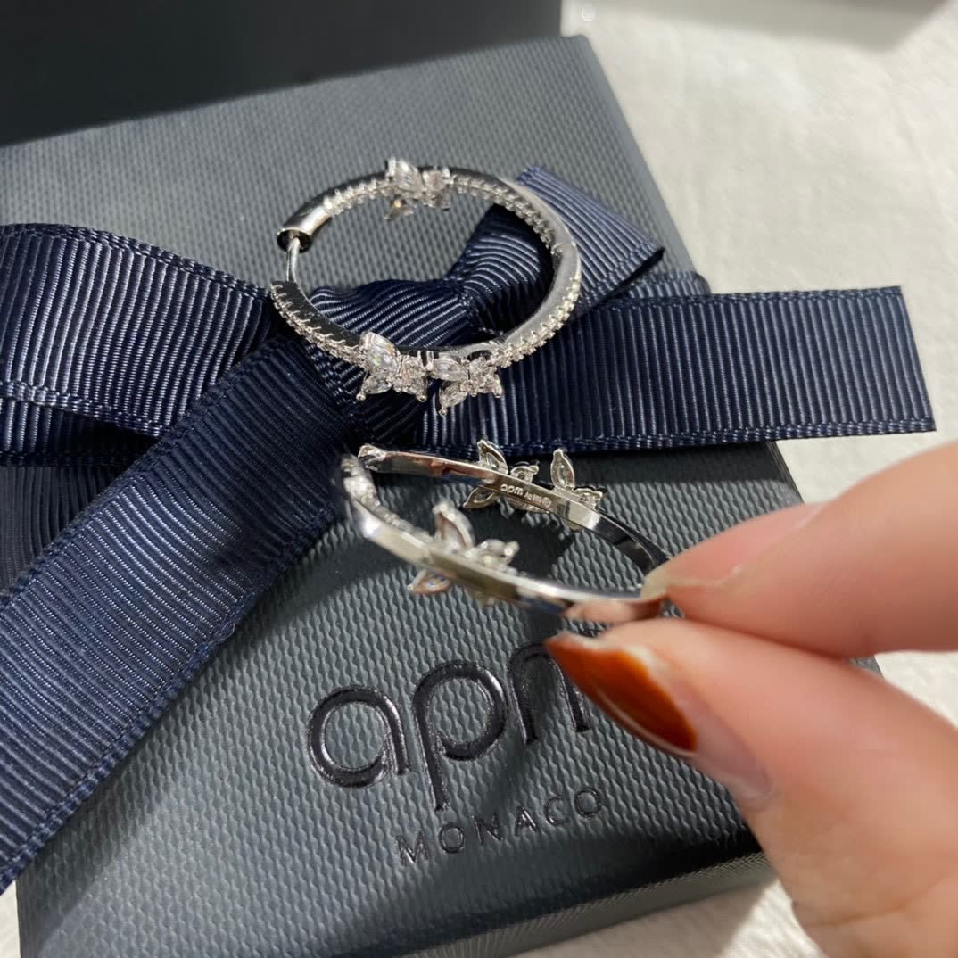 APM Monaco Silver Hoop Earrings with Butterfly Design